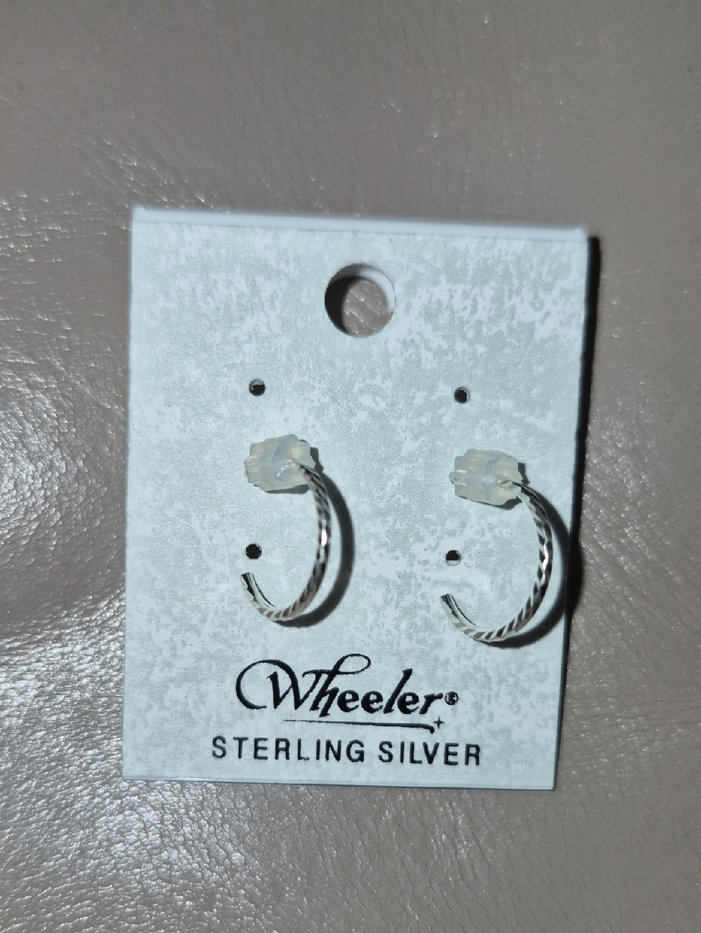 Sterling Silver Twisted Hoop Earrings in Silver